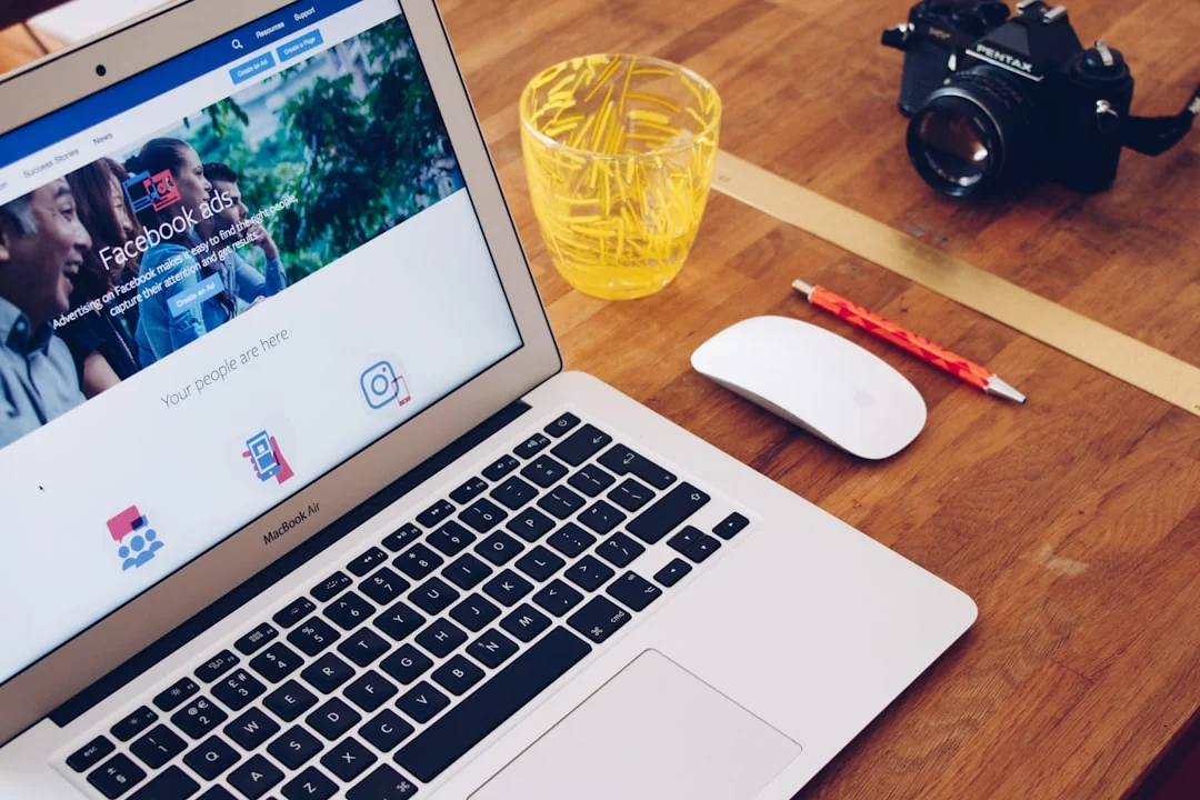 Stylish workspace with laptop and monitor for social media marketing.